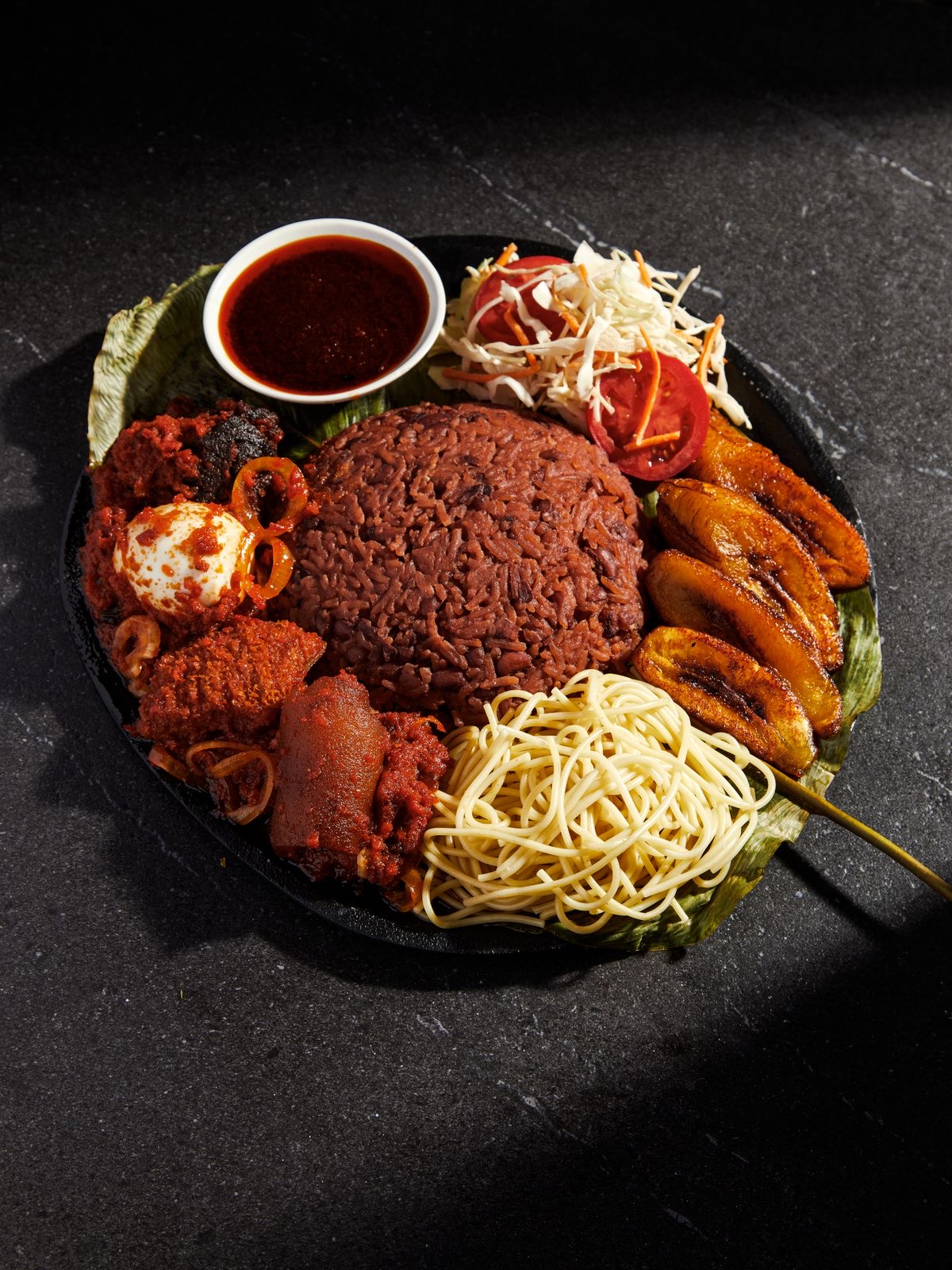 Ghana wakay rice with smoked pepper and soft egg